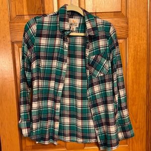 Field + Stream flannel. Women’s medium. A sort of tealish green, purple.